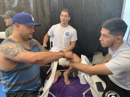 Matthew Lopez getting wrapped up