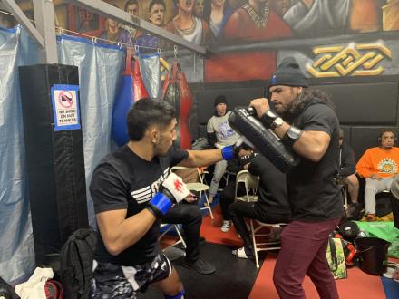 Gabe Green warming up Johnny Arreola