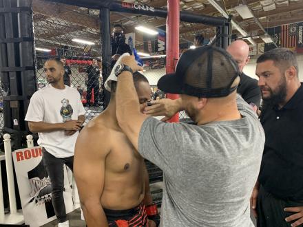 Tracy greasing Carlos