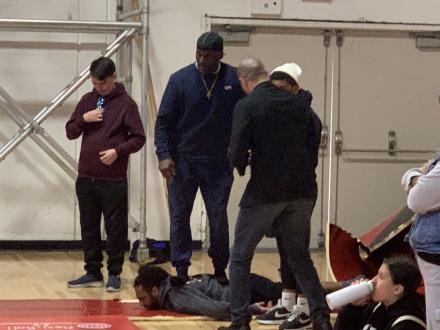 Antonio McKee getting AJ McKee ready