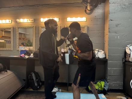 Gabe Green warming Kam up