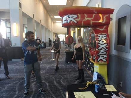 Gabe trying out the punching bag machine.