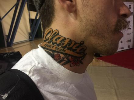 Tyler Wombles w\ a fresh tattoo of his team logo (Classic Fight Team)