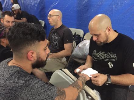 Jesse Herrera getting wrapped up