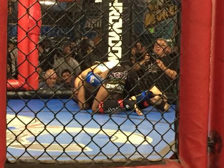 Dan Perez on his opponent's back